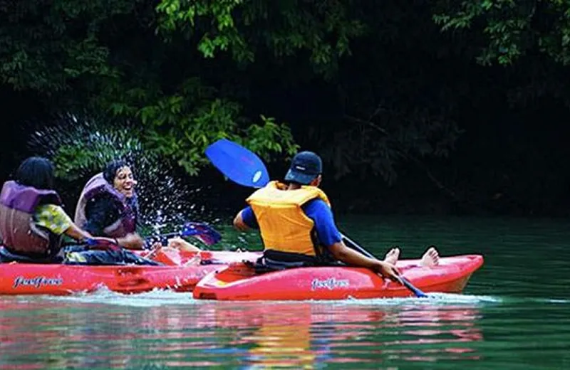 Kayaking on the calm backwaters of the Kali River